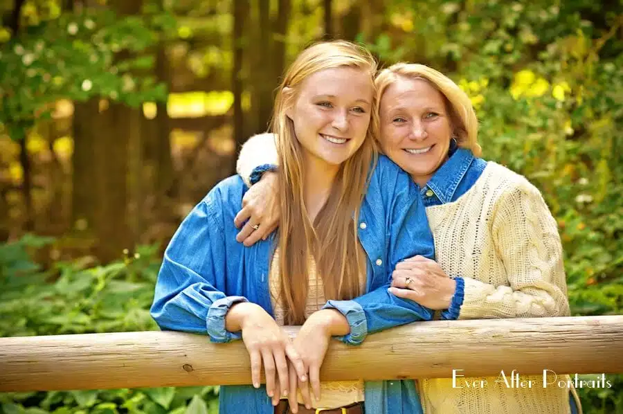 Mother and daughter in the woods.